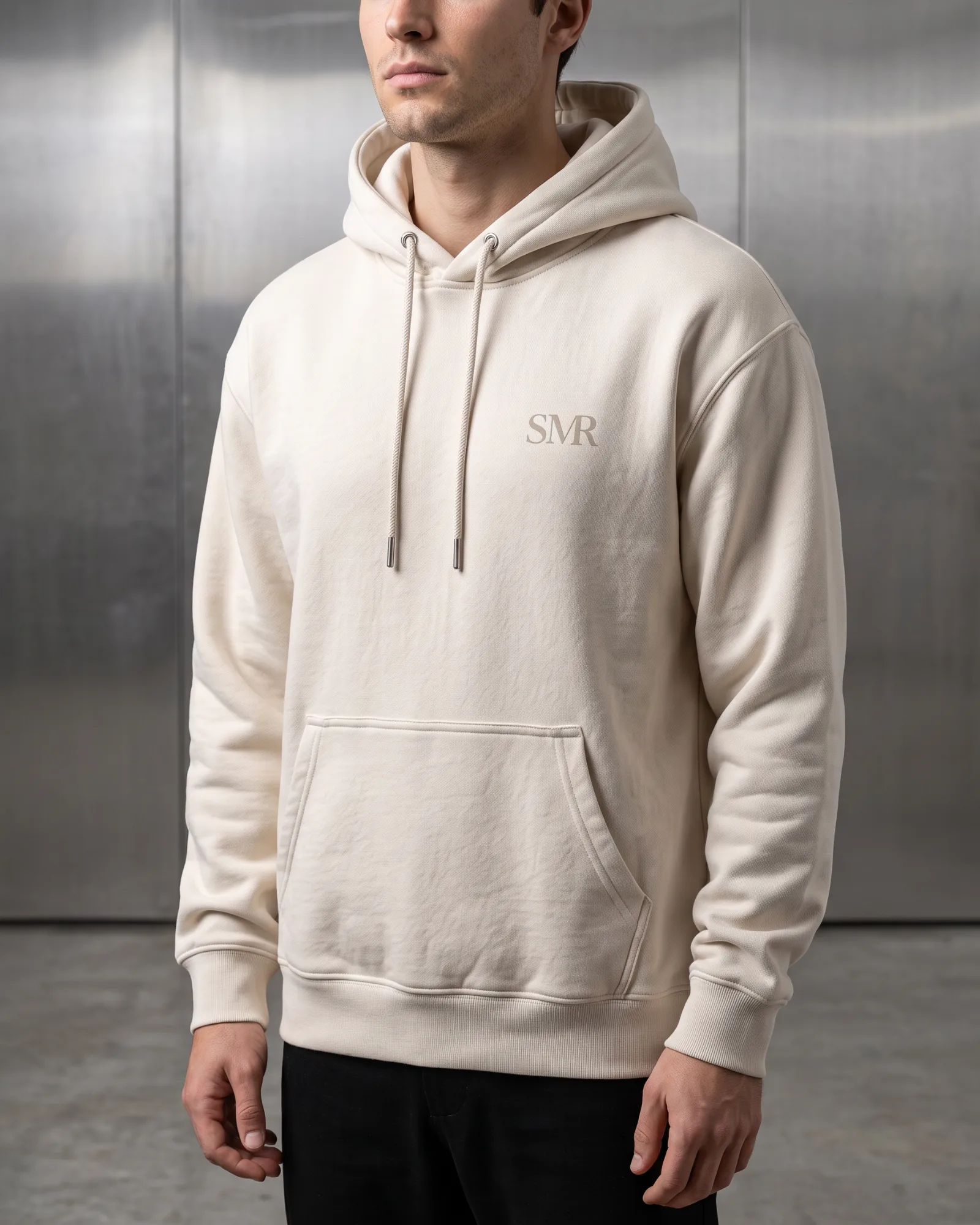 SMR Brand Index Hood bone worn by a model